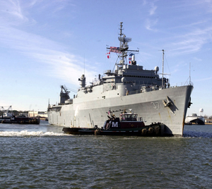 Uss Portland (lsd 37) Sails Through The Harbor As It Heads Out To Sea Image