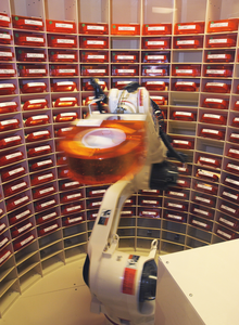 The Autoscript Iii, Prescription Filling Robot, Picks Up A Bin Of Medication At The National Naval Medical Center In Bethesda, Md. Image
