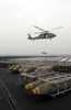 A Sh-60f Knighthawk Helicopter Delivers Ammunition During An Ammo Onload Aboard Uss Constellation (cv 64). Image