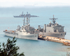 The Amphibious Transport Dock Ship U.s.s. Juneau (lpd-10) And The Amphibious Dock Landing Ship U.s.s. Fort Mc Henry (lsd 43) Are Pier Side In Okinawa, Japan Image