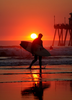 Surfing At Sunset Image