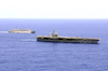 The U.s. Navy  Nuclear Powered Aircraft Carrier Uss Nimitz (cvn 68) And The Fast Combat Support Ship Uss Bridge (aoe 10) Underway While In The Pacific Ocean Image