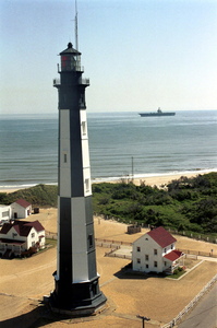 Cvn 71 Passes Lighthouse Image