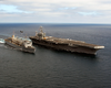 The Nuclear Powered Aircraft Carrier Uss John C. Stennis (cvn 74) Performs An Underway Replenishment (unrep) With The Fast Combat Support Ship Uss Sacramento (aoe 1). Image