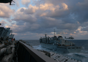 He Nuclear Powered Aircraft Carrier, Uss George Washington (cvn 73) Approaches The Military Sealift Command (msc) Fast Combat Support Ship Usns Supply (t-aoe 6) During An Early Morning Underway Replenishment. Image