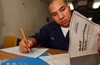 Us Navy N P Seaman Chanthorn Peou Of San Diego Calif Takes His Scholastic Aptitude Test Sat Aboard The Conventionally Powered Aircraft Carrier Uss Kitty Hawk Cv Image