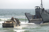 A Lighter Amphibious Re-supply Cargo (larc) Vehicle Drives Into The Waves Image