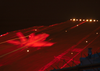 An F/a-18 Hornet Assigned To Carrier Air Wing One (cvw-1) Catches The Wire During An Arrested Landing On The Flight Deck During Night Flight Operations Aboard Uss Enterprise (cvn 65). Image