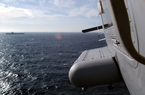 Rear View From An Sh-60 Showing Uss Harry S. Truman (cvn 75) On The Horizon Image