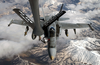 Over The Middle East, An F/a-18 Hornet Assigned To The Uss Harry S. Truman, Conducts Refueling Operations With A U.s. Air Force Kc-135r Stratotanker, Assigned To The 196th Expeditionary Air Refueling Squadron Image