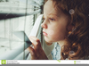 Child Looking Out Window Clipart Image