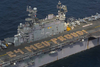 Marines Assigned To The 24th Marine Expeditionary Unit (meu) Embarked Aboard The Amphibious Assault Ship Uss Nassau (lha 4), Create Formation Lettering On The Ship S Flight Deck Spelling Out 24 Meu Proud! Image