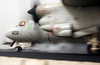 An E-2c Hawkeye Prepares To Launch From The Flight Deck Aboard The Aircraft Carrier Uss Kitty Hawk (cv 63), While A Sandstorm Blows Across The Arabian Gulf Region Image