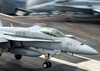 An F/a-18c Hornet Assigned To  Valions  Of Strike Fighter Squadron One Five (vfa-15) Makes And Arrested Landing On The Flight Deck Aboard Uss Harry S Truman (cvn 75). Image