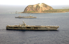 The Nuclear Powered Aircraft Carrier Uss Carl Vinson (cvn 70) And The Fast Combat Support Ship Uss Sacramento (aoe 1) Pass Mount Suribachi On The Island Of Iwo Jima. Image