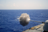 The Destroyer Uss Thorn (dd 988) Fires Her Aft Mk 45 5-inch/54 Caliber Lightweight Gun Mount During Sink Exercise (sinkex) 2003 Off The Coast Of Virginia Image