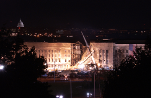Flag On The Side Of The Pentagon At Night Image
