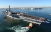 The Decommissioned Aircraft Carrier Midway Makes Its Way Across The San Diego Bay To Its Final Resting Place At Navy Pier Where It Will Become The Largest Museum Devoted To Carriers And Naval Aviation. Image