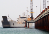 A U.s. Army Logistics Support Vessel (lsv) Pulls Alongside The U.s. Navy Elevated Causeway System-modular (elcas-m) For Equipment Offload During Continued Joint Logistics Over The Shore (jlots) Operations Image