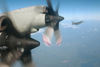 An Italian Air Force F-16 Fighter Intercepts A U.s. Navy P-3c Orion. Image