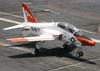 A T-45c Goshawk Makes An Arrested Landing On The Flight Deck. Image