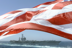 The Uss Nimitz (cvn 68) Steams Alongside The Princeton As The American Flag Waves Proudly In The Wind. Image