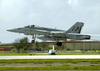 An F/a-18  Hornet  From The  Royal Maces  Of Strike Fighter Squadron Two Seven (vfa 27), Launches From An Airstrip Located At Andersen Afb In Guam Image