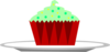Christmas Cupcake With Sprinkles On A Plate Clip Art