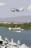 An Sh-60b Seahawk Assigned To The Indians Of Helicopter Anti-submarine Squadron Six (hs-6), Passes By The Uss Arizona Memorial While Entering Pearl Harbor, Hawaii. Clip Art