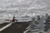An Fa-18a Hornet  Launches From The Flight Deck. Clip Art