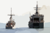 The Mine Countermeasures Ship Uss Patriot (mcm 7) Completes Fuel Connections While Preparing To Take On Fuel From The Japanese Minesweeper Tender Jds Bungo (mst 464) During An Underway Replenishment (unrep) Operation. Clip Art