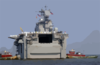 Uss Saipan (lha 2), Is Guided To The Pier By Tugboats After Returning From Deployment To The Arabian Gulf In Support Of Operation Iraqi Freedom Clip Art