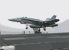 An F/a-18 Hornet Assigned To The Checkerboards Of Marine Strike Fighter-attack Squadron Three One Two (vmfa-312) Lands On The Flight Deck Aboard Uss Enterprise (cvn 65). Clip Art