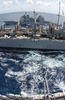 The Guided Missile Cruiser Uss Antietam (cg 54) Pulls Alongside The Fast Combat Support Ship Uss Sacramento (aoe 1) While Conducting An Underway Replenishment Image