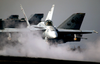 An F/a-18c Hornet Prepares To Launch From The Flight Deck Aboard Uss Abraham Lincoln (cvn 72). Image