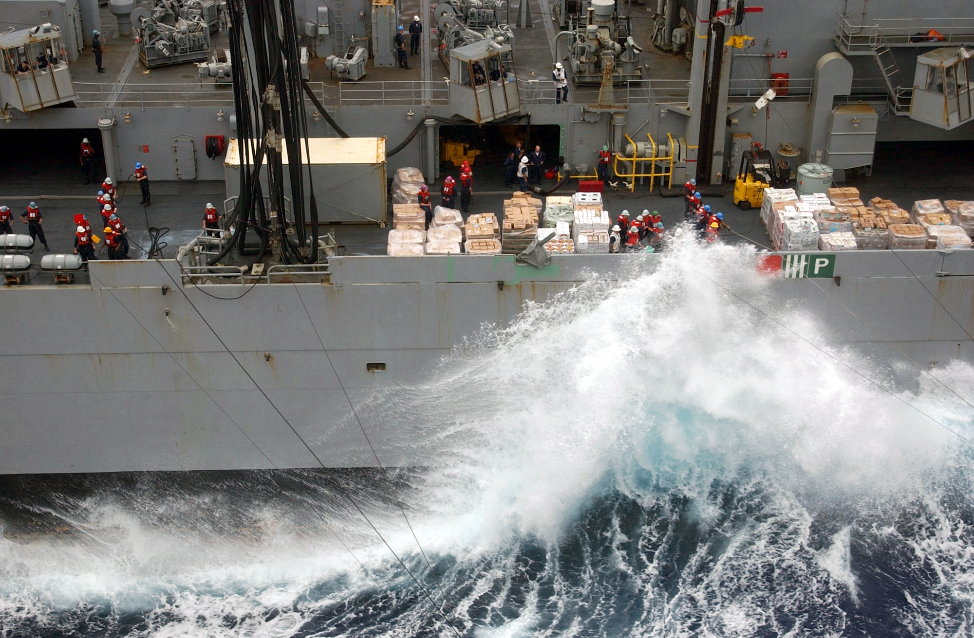 Sailors Aboard The Fast Combat Support Ship Uss Sacramento (aoe 1) Work
