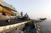 An F/a-18c Hornet, Loaded With A 2,000-lb. Gbu-12 Guided Missile, Is Relocated On The Flight Deck Aboard Uss Kitty Hawk (cv 63). Image