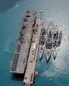 The Amphibious Assault Ship Uss Essex (lhd 2), And The Japanese Maritime Defense Force (jmsdf) Ships Shimakaze (ddg 172), Myoukou (ddg 175), Hamagiri (dd 155) And Natusio (ss 584) Pier-side Okinawa, Japan Image
