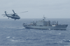 An Sh-60 Seahawk From Uss Kitty Hawk Flies Toward Usns Concord (t-afs 5) Image