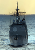 The Guided Missile Cruiser Uss Vella Gulf (cg 72) Maneuvers Aft Of The Nuclear Powered Aircraft Carrier Uss George Washington (cvn 73). Image