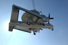 A Retired E-2 Hawkeye Is Hoisted Aboard The Decomissioned Aircraft Carrier Midway At Naval Air Station North Island. Image