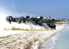 Landing Craft Air Cushion Eighty Four (lcac-84) Departs The Beach With Supplies, Ammunition, And Vehicles Image