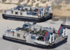Landing Craft Air Cushion (lcac) Vehicles From Assault Craft Unit Five (acu-5), Loaded With Elements Of The 1st And 3rd Light Armored Reconnaissance (lar) Units. Clip Art